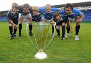 25 May 2011; ictured at the launch of the Volkswagen Leinster Rugby Summer Camps are Leinster players and supporters, from left, Neil Durkan, age 11, Greystones, Eoin Reddan, John Durkan, Age 11, Stradbrook, Richardt Strauss, James Durkan-Watson, age 11, Old Belvedere, and Isa Nacewa. Leinster players Isa Nacewa, Richardt Strauss and Eoin Reddan with the Heineken Cup Trophy were on hand today to launch the Volkswagen Leinster Rugby Summer Camps which will run throughout the province in July and August. Players will be taught the basic skills of the game by fully accredited IRFU coaches and they will also have the chance to meet their heroes with two senior Leinster players expected to visit each camp along with the Heineken Cup. For a full list of venues or to book a place please log on to www.leinsterrugby.ie/summercamps. Donnybrook Stadium, Donnybrook, Dublin. Picture credit: Pat Murphy / SPORTSFILE