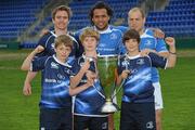 25 May 2011; Pictured at the launch of Volkswagen Leinster Rugby Summer Camps are, back row from left, Leinster players Eoin Reddan, Isa Nacewa and Richardt Strauss along with, front row from left, Neil Durkan, age 11, Greystones, John Durkan, Age 11, Stradbrook, and James Durkan - Watson, age 11, Old Belvedere. Leinster players Isa Nacewa, Richardt Strauss and Eoin Reddan the Heineken Cup today launched the Volkswagen Leinster Rugby Summer Camps which will run throughout the province in July and August. Players will be taught the basic skills of the game by fully accredited IRFU coaches and they will also have the chance to meet their heroes with two senior Leinster players expected to visit each camp along with the Heineken Cup. For a full list of venues or to book a place please log on to www.leinsterrugby.ie/summercamps. Donnybrook Stadium, Donnybrook, Dublin. Picture credit: Pat Murphy / SPORTSFILE