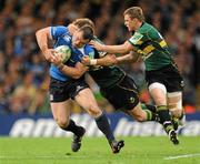 21 May 2011; Cian Healy, Leinster, is tackled by Steve Myler and Chris Ashton, Northampton Saints. Heineken Cup Final, Leinster v Northampton Saints, Millennium Stadium, Cardiff, Wales. Picture credit: Matt Browne / SPORTSFILE