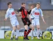 26 May 2011; Anto Flood, Bohemians, in action against David O'Connor, left, and Paul Corry, UCD. Airtricity League Premier Division, Bohemians v UCD, Dalymount Park, Dublin. Picture credit: Barry Cregg / SPORTSFILE