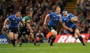 21 May 2011; Kevin McLaughlin, Leinster, with support from Cian Healy, left, and Leo Cullen. Heineken Cup Final, Leinster v Northampton Saints, Millennium Stadium, Cardiff, Wales. Picture credit: Ray McManus / SPORTSFILE