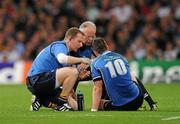 21 May 2011; Jonathan Sexton, Leinster, is attended to by Leinster team doctor Prof Arthur Tanner, right, and physiotherapist James Allen. Heineken Cup Final, Leinster v Northampton Saints, Millennium Stadium, Cardiff, Wales. Picture credit: Ray McManus / SPORTSFILE