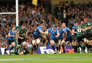 21 May 2011; Jamie Heaslip, Leinster, is tackled by Roger Wilson, Northampton Saints. Heineken Cup Final, Leinster v Northampton Saints, Millennium Stadium, Cardiff, Wales. Picture credit: Matt Browne / SPORTSFILE