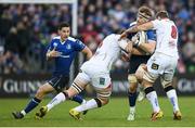 31 December 2016; Jamie Heaslip of Leinster is tackled by Kieran Treadwell, left, and Roger Wilson of Ulster during the Guinness PRO12 Round 12 match between Leinster and Ulster at the RDS Arena in Dublin. Photo by Stephen McCarthy/Sportsfile