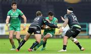 7 January 2017; Rory Parata of Connacht is tackled by Ashley Beck and Josh Matavesi of Ospreys during the Guinness PRO12 Round 13 match between Ospreys and Connacht at Liberty Stadium  in Swansea, Wales. Photo by Chris Fairweather/Sportsifle