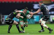 7 January 2017; Quinn Roux of Connacht is tackled by Dafydd Howells and Lloyd Ashley of Ospreys during the Guinness PRO12 Round 13 match between Ospreys and Connacht at Liberty Stadium  in Swansea, Wales. Photo by Chris Fairweather/Sportsifle