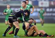 7 January 2016; John Cooney of Connacht is tackled by Sam Davies and Ashley Beck of Ospreys during the Guinness PRO12 Round 13 match between Ospreys and Connacht at Liberty Stadium  in Swansea, Wales. Photo by Chris Fairweather/Sportsfile