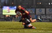 7 January 2017; Simon Zebo of Munster is tackled by Teddy Thomas of Racing 92 on his way to scoring his side's first try during the European Rugby Champions Cup Pool 1 Round 1 match between Racing 92 and Munster at the Stade Yves-Du-Manoir in Paris, France. Photo by Stephen McCarthy/Sportsfile