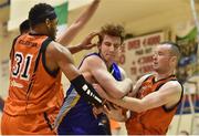 7 January 2017; Anthony Silvestri of UCD Marian under pressure from Jermaine Turner, left, and Paddy Sullivan of Pyrobel Killester during the Hula Hoops Men's National Cup semi-final match between Pyrobel Killester and UCD Marian at the Neptune Stadium in Cork. Photo by Brendan Moran/Sportsfile
