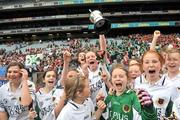 27 May 2011; Niamh Mahon, captain, Pius X GNS, and her team-mates celebrate with the Corn Bean Uí Phuirséil. Allianz Cumann na mBunscol Finals, Corn Bean Uí Phuirséil, Pius X GNS, Terenure v St. Colmcille's, Knocklyon, Croke Park, Dublin. Picture credit: Brian Lawless / SPORTSFILE