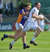 22 May 2011; Ronan Sweeney, Kildare, in action against Michael McLoughlin, Wicklow. Leinster GAA Football Senior Championship First Round, Kildare v Wicklow, O'Moore Park, Portlaoise, Co. Laois. Picture credit: Brian Lawless / SPORTSFILE