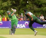 28 May 2011; Kevin O'Brien, Ireland, hits the ball to the boundry for four. RSA ODI Series, Ireland v Pakistan, Stormont, Belfast, Co. Antrim. Picture credit: Oliver McVeigh / SPORTSFILE