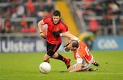 28 May 2011; Martin Clarke, Down, in action against Ciaran McKeever, Armagh. Ulster GAA Football Senior Championship Quarter-Final, Armagh v Down, Morgan Athletic Grounds, Armagh. Picture credit: Ray McManus / SPORTSFILE