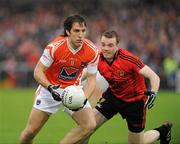 28 May 2011; Billie Joe Padden, Armagh, in action against Brendan McArdle, Down. Ulster GAA Football Senior Championship Quarter-Final, Armagh v Down, Morgan Athletic Grounds, Armagh. Picture credit: Oliver McVeigh / SPORTSFILE
