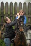 29 May 2011; Ruth Waldron with daughter Saoirse, from Ballinasloe, Co. Galway, ahead of the Scarteen Pony Club Minimus Challenge. Tipperary Racecourse, Limerick Junction, Tipperary Picture credit: Stephen McCarthy / SPORTSFILE