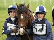 29 May 2011; Leona Kennedy, left, and Zoe Mehigan, from Avondhu Pony Club, pose for a picture during the Scarteen Pony Club Minimus Challenge. Tipperary Racecourse, Limerick Junction, Tipperary Picture credit: Stephen McCarthy / SPORTSFILE