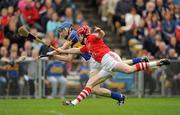 29 May 2011; John O'Brien, Tipperary, in action against Shane O'Neill, Cork. Munster GAA Hurling Senior Championship, Quarter-Final, Tipperary v Cork, Semple Stadium Thurles, Co. Tipperary. Picture credit: Stephen McCarthy / SPORTSFILE