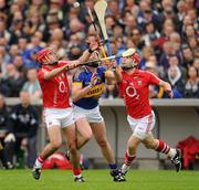 29 May 2011; Cian McCarthy, left, and Paudie O'Sullivan, Cork, in action against Padraic Maher, Tipperary. Munster GAA Hurling Senior Championship, Quarter-Final, Tipperary v Cork, Semple Stadium, Thurles, Co. Tipperary. Picture credit: Ray McManus / SPORTSFILE