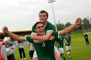 29 May 2011; Derrick Williams, Republic of Ireland, celebrates with team-mate Connor Murphy their side's victory over Italy. The Republic of Ireland team has secured a place in the UEFA European Under-19 Championship final stages, to be held in Romania. UEFA Under 19 Championship Elite Round, Republic of Ireland v Italy, Kolobrzeg, Poland. Picture credit: Rory Geary / SPORTSFILE