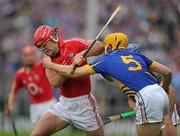 29 May 2011; Niall McCarthy, Cork, in action against David Young, Tipperary. Munster GAA Hurling Senior Championship, Quarter-Final, Tipperary v Cork, Semple Stadium, Thurles, Co. Tipperary. Picture credit: Stephen McCarthy / SPORTSFILE