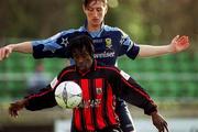 20 January 2002; Eric Lavine of Longford Town in action against Clive Delaney of UCD during the Eircom League Premier Division match between UCD and Longford Town at Belfield Park in UCD, Dublin. Photo by Pat Murphy/Sportsfile