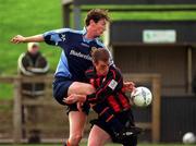 20 January 2002; Clive Delaney of UCD in action against  Fergal Coleman of Longford Town during the Eircom League Premier Division match between UCD and Longford Town at Belfield Park in UCD, Dublin. Photo by Pat Murphy/Sportsfile