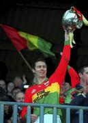 20 January 2002; Carlow captain Andrew Corden lifting the cup following the O'Byrne Cup final match between Carlow and Wicklow at Dr Cullen Park in Carlow. Photo by Damien Eagers/Sportsfile