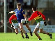 20 January 2002; Fergus Daly of Wicklow in action against Johnny Kavanagh of Carlow during the O'Byrne Cup final match between Carlow and Wicklow at Dr Cullen Park in Carlow. Photo by Damien Eagers/Sportsfile