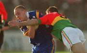 20 January 2002; Don Jackson of Wicklow in action against Sean Kavanagh of Carlow during the O'Byrne Cup final match between Carlow and Wicklow at Dr Cullen Park in Carlow. Photo by Damien Eagers/Sportsfile