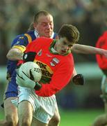 20 January 2002; Willie Quinlan of Carlow in action against Don Jackman of Wicklow during the O'Byrne Cup final match between Carlow and Wicklow at Dr Cullen Park in Carlow. Photo by Damien Eagers/Sportsfile