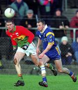 20 January 2002; Anthony Nolan of Wicklow in action against Philip Nolan of Carlow during the O'Byrne Cup final match between Carlow and Wicklow at Dr Cullen Park in Carlow. Photo by Damien Eagers/Sportsfile