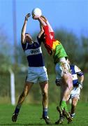 13 January 2002; Thomas Walshe of Carlow in action against John Kealy of Laois during the O'Byrne Cup semi-final match between Carlow and Laois at McCann Park in Portarlington, Laois. Photo by Damien Eagers/Sportsfile