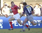 12 January 2002; Jeremy Staunton of Munster races clear of Shaun Longstaff of Castres during the Heineken Cup Pool 4 Round 6 match betweeen Castres and Munster at Stade Pierre Antoine in Castres, France. Photo by Brendan Moran/Sportsfile