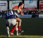 12 January 2002; Mike Mullins of Munster is tackled by Guillaume Delmotte of Castres during the Heineken Cup Pool 4 Round 6 match betweeen Castres and Munster at Stade Pierre Antoine in Castres, France. Photo by Brendan Moran/Sportsfile