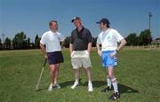 26 January 2002; Referee Willie Barrett, right, with managers, Nicky English and Brian Cody,  discuss the 'local rules'  during a training session prior to the Vodafone All Star tour at the Hurling Club of Argentina in Hurlingham, Buenos Aires, Argentina. Photo by Ray McManus/Sportsfile