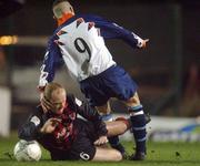 25 January 2002; Dave Hill of Bohemians in action against Robbie Martin of UCD during the Eircom League Premier Division match between Bohemians and UCD at Dalymount Park in Dublin. Photo by David Maher/Sportsfile