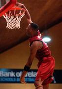 26 January 2002; Jermaine Turner of Frosties Tigers Tralee dunks the ball against Burgerking Limerick during the ESB Men's National Cup semi-final match between Frosties Tigers and Burgerking Limerick in Tallaght, Dublin. Photo by Brendan Moran/Sportsfile