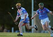 26 January 2002; Eamon Corcoran of the 2001 Eircell Vodafone GAA All-Stars races clear of Henry Shefflin of the 2000 Eircell  GAA All-Stars during the Vodafone All Star tour at the Hurling Club of Argentina in Hurlingham, Buenos Aires, Argentina. Photo by Ray McManus/Sportsfile