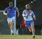 26 January 2002; Eamon Corcoran of the 2001 Eircell Vodafone GAA All-Stars races clear of Henry Shefflin of the 2000 Eircell  GAA All-Stars during the Vodafone All Star tour at the Hurling Club of Argentina in Hurlingham, Buenos Aires, Argentina. Photo by Ray McManus/Sportsfile