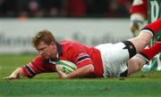 26 January 2002; Anthony Horgan of  Munster goes over for his try against during the Heineken Cup Quarter Final match between Stade Francais and Munster at Stade Jean-Bouin in Paris, France. Photo by Matt Browne/Sportsfile