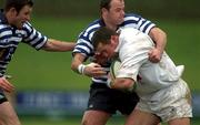 26 January 2002; Jan Cunningham of Dungannon is tackled by Conor Kilroy, right, and Gary Brown of Blackrock during the AIB Rugby League Division 1 match between Dungannon and Blackrock at Stevenson Park in Tyrone. Photo by Damien Eagers/Sportsfile