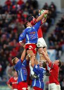 26 January 2002; Paul O'Connell of Munster takes the ball in the lineout from Remy Martin of Stade Francais during the Heineken Cup Quarter Final match between Stade Francais and Munster at Stade Jean-Bouin in Paris, France. Photo by Matt Browne/Sportsfile