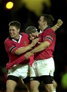 26 January 2002; Ronan O'Gara of Munster, left, celebrates with team-mate Rob Henderson following the Heineken Cup Quarter Final match between Stade Francais and Munster at Stade Jean-Bouin in Paris, France. Photo by Matt Browne/Sportsfile