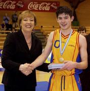 27 January 2002; St Vincent's captain Dermot Madson receives the MVP from Debbie Massey, Chief Executive of the IBA during the ESB Men's Junior Cup Final between St Vincent's and  Waterford Crystal at ESB Arena in Tallaght, Dublin. Photo by Brendan Moran/Sportsfile