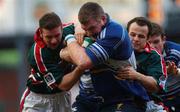 27 January 2002; Victor Costello of Leinster is tackled by Leicester's Austin Healy, left, and Geordan Murphy during the Heineken Cup Quarter Final match between Leinster and Leicester at Welford Road in Leicester. Photo by Aoife Rice/Sportsfile