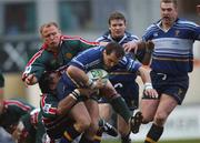 27 January 2002; Keith Gleeson of Leinster is tackled by Freddie Tuilagi and Neil Back of Leicester during the Heineken Cup Quarter Final match between Leinster and Leicester at Welford Road in Leicester. Photo by Aoife Rice/Sportsfile