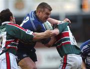 27 January 2002; Victor Costello of Leinster is tackled by Austin Healy, left, and Geordan Murphy of Leicester during the Heineken Cup Quarter Final match between Leinster and Leicester at Welford Road in Leicester. Photo by Aoife Rice/Sportsfile