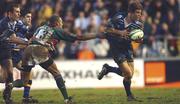 27 January 2002; Adam Margo of Leinster is tackled by Leon Lloyd of Leicester during the Heineken Cup Quarter Final match between Leinster and Leicester at Welford Road in Leicester. Photo by Aoife Rice/Sportsfile