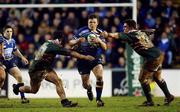 27 January 2002; Brian O'Driscoll of Leinster is tackled by Leicester's Austin Healy, left, and Rod Kafer during the Heineken Cup Quarter Final match between Leinster and Leicester at Welford Road in Leicester. Photo by Aoife Rice/Sportsfile