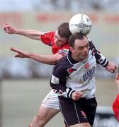 27 January 2002; Gary Haylock of Dundalk in action against Owen Heary of Shelbourne during the eircom League Premier Division match between Dundalk and Shelbourne at Oriel Park in Dundalk. Photo by David Maher/Sportsfile